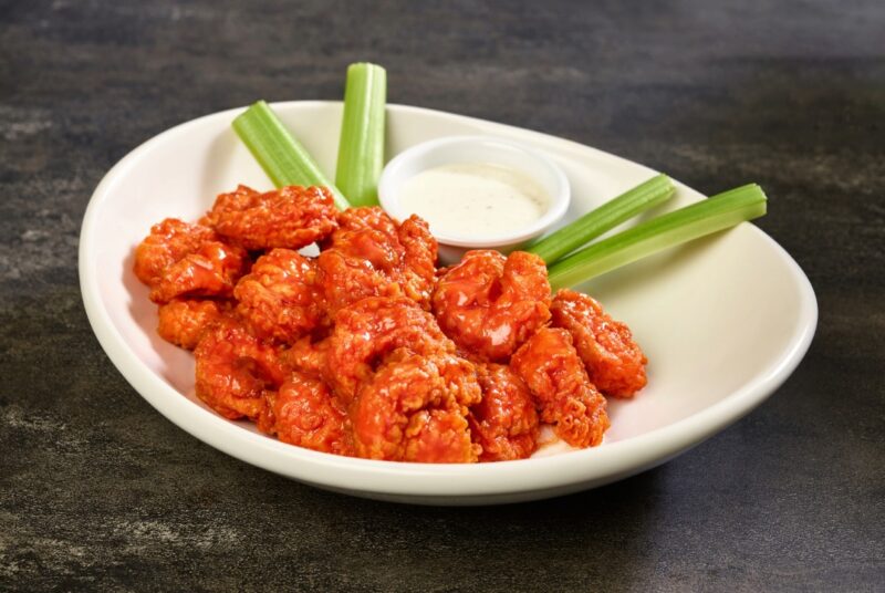 Tossed shrimp in buffalo sauce