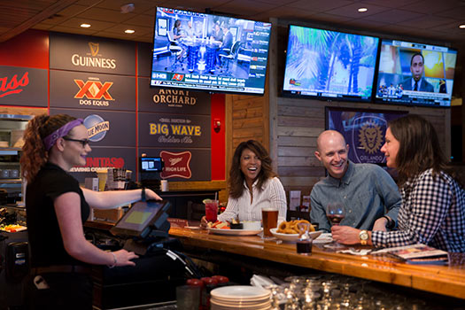 professionals hanging out after work at miller's ale house