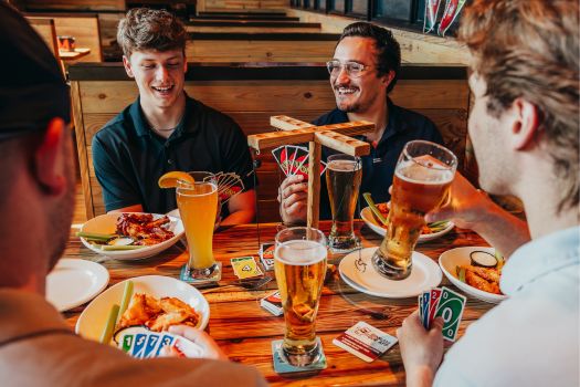 friends and family enjoying beer and chicken